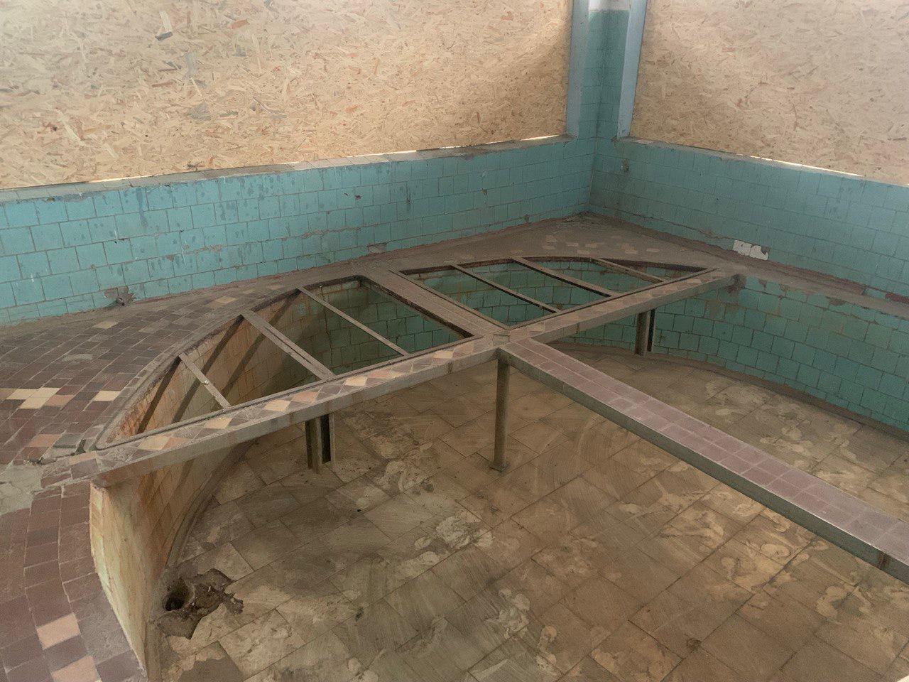Drained training pool rebuilt by hand