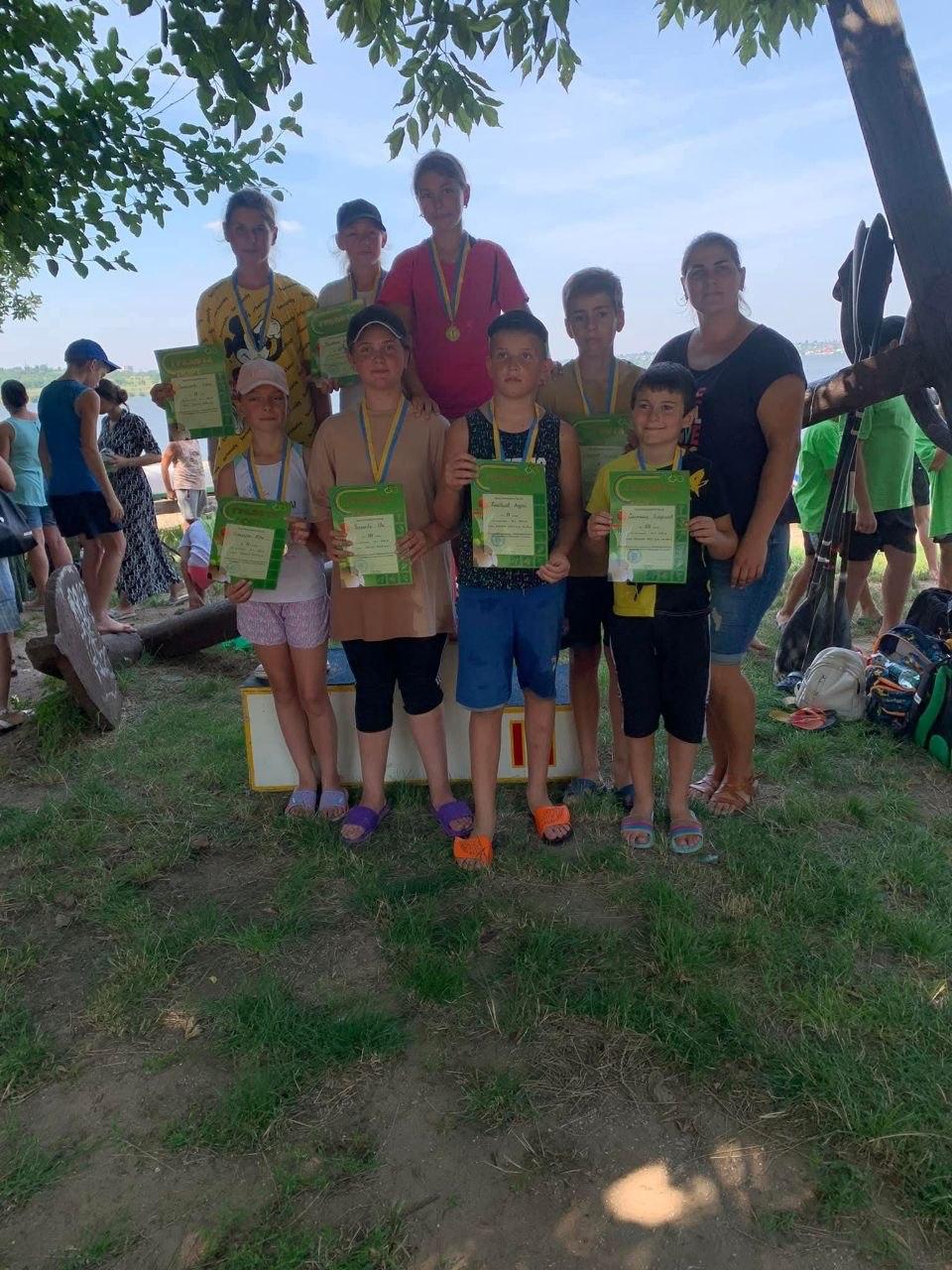 The youngest with their diplomas