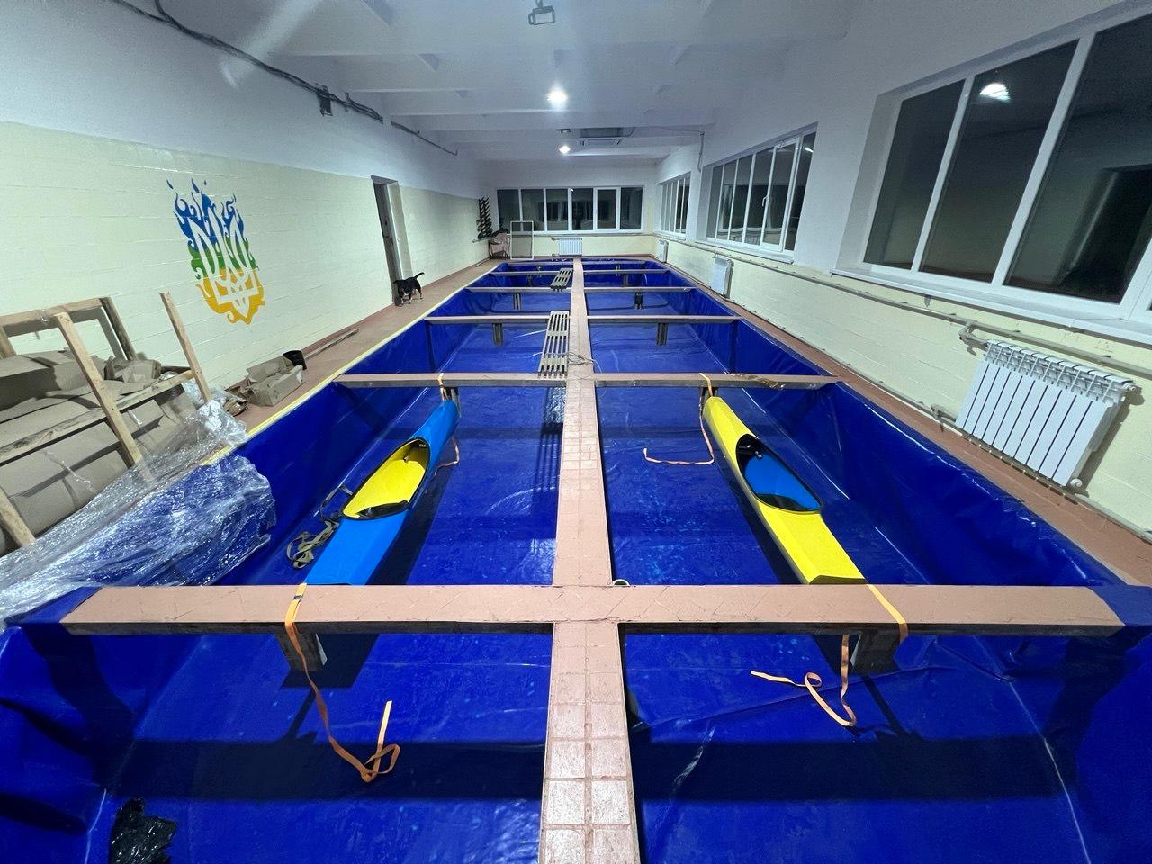 Refurbished pool with kayaks